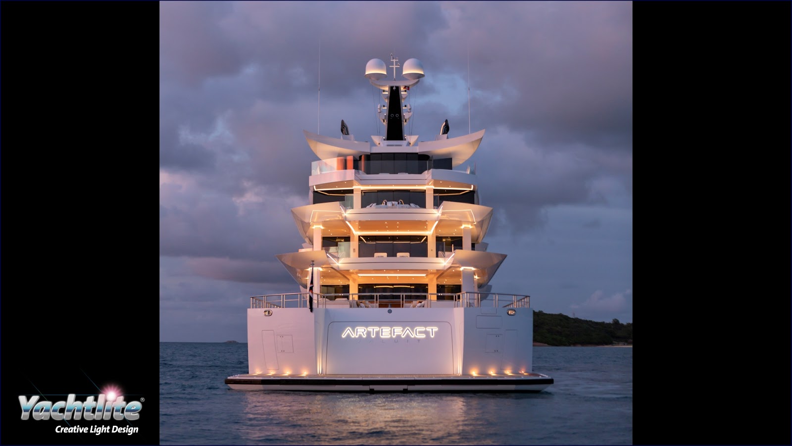 lit up yacht sign at sea