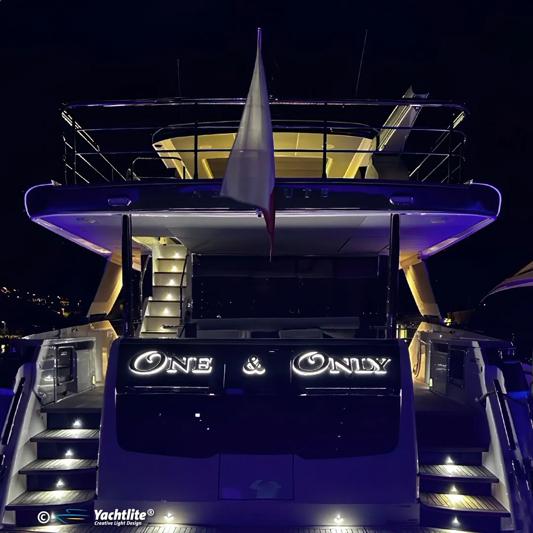 night time image of lit up yacht